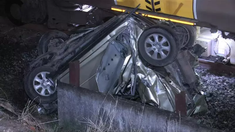 Woman's Lucky Escape After Car Hit by Train in Logan