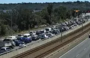Vehicle Rollover Causes Major Delays on Perth's Kwinana Freeway