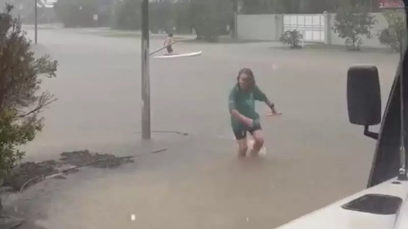 Mission Beach Cut Off by Monsoon Deluge, Kayaks Used on Flooded Roads