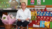 Tears and tributes as Townsville teacher aide Julie Waters retires after 41 years