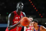 Wildcats Vow to Unleash Jo Lual-Acuil's Power Against Brisbane Bullets