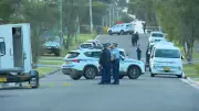 Woman, 20, charged over Mount Druitt shooting where 30+ rounds fired