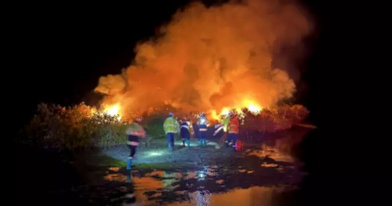 Firefighters Wade Through Lake Macquarie to Combat Island Blaze