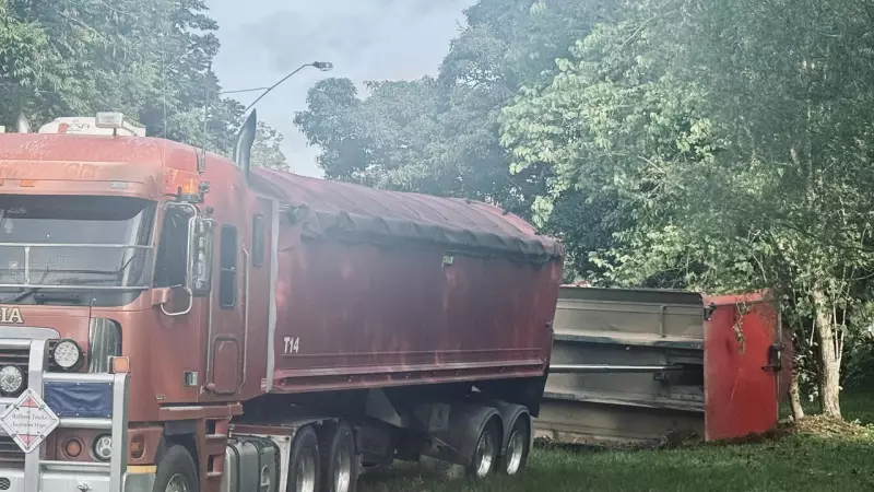 Trailer Overturns on Gillies Range Road, Spilling Sand and Causing Delays