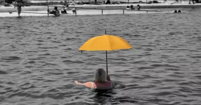 Newcastle Woman's Yellow Umbrella Photo Goes Viral, Capturing Global Attention