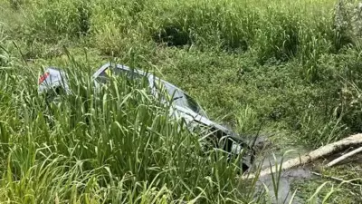 Ute Aquaplanes Off Bruce Highway, Crashes into Ditch at Cardwell Range