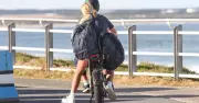 Figtree Mother Faces Abuse While Riding Legal E-Bike with Daughter