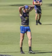 West Coast Eagles' Injury Woes Mount as Reuben Ginbey Sidelined Ahead of Season