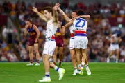 AFL Opening Round's Future Debated as Bulldogs Stun Lions, Blues Struggle