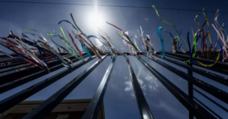 Clergy Abuse Survivors Hold Ribbon Fence Ceremony at Trinity College