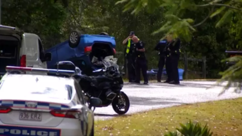 Woman killed by rolling car while walking dog on rural Qld road