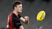 Essendon’s Nik Cox returns after 630 days, near concussion retirement