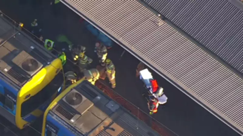 Schoolboy critical after falling under train at North Melbourne Station
