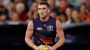 Crows defender Mark Keane's brother Vinny dies after illness