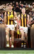 Hawks co-captains firm to face Dockers after light training session