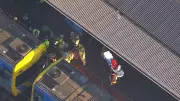 Schoolboy critical after falling under train at North Melbourne Station