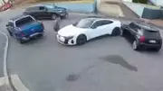 Shocking Footage: Man Leaps to Safety as Stolen SUV Drives at Him
