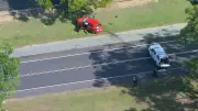 Woman dies in head-on crash with allegedly stolen ute north of Brisbane