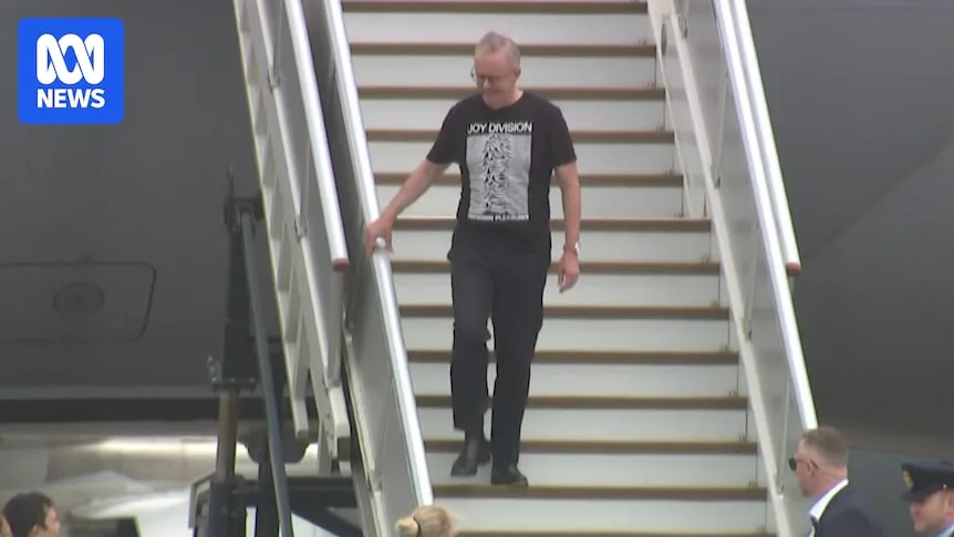 Coalition Divided Over Albanese's Joy Division Shirt Criticism