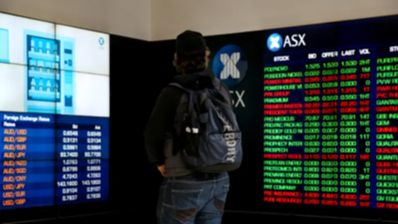 Australian shares flat as tech stocks surge, Middle East tensions weigh