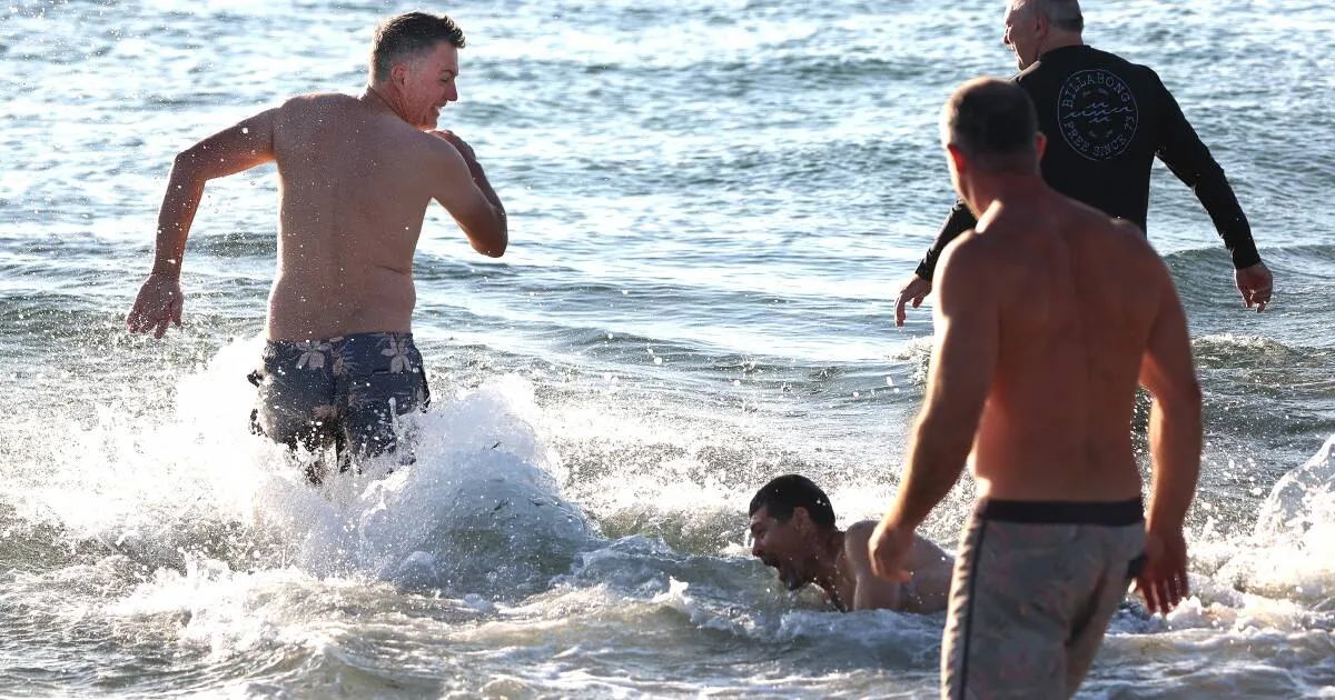 Dawn Memorial Swim Honors Former Police Officer Mark Lucas
