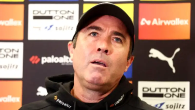Essendon's Brad Scott payout raises soft cap questions