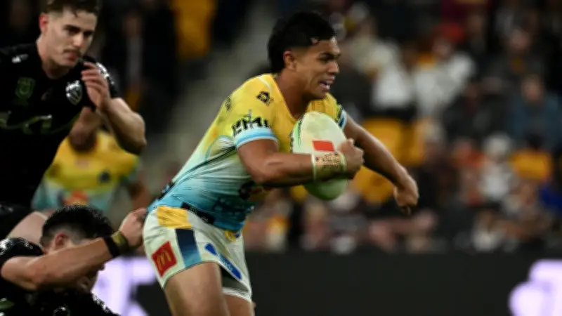 Keano Kini's magic try sinks Broncos 28-23, Titans stun Brisbane
