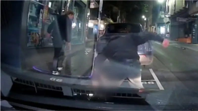 Manhunt for attackers who broke student's jaw in Melbourne CBD
