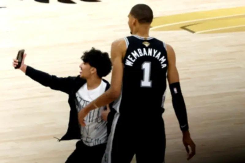 NBA Bans Selfie-Seeking Fan for Life After Finals Court Invasion