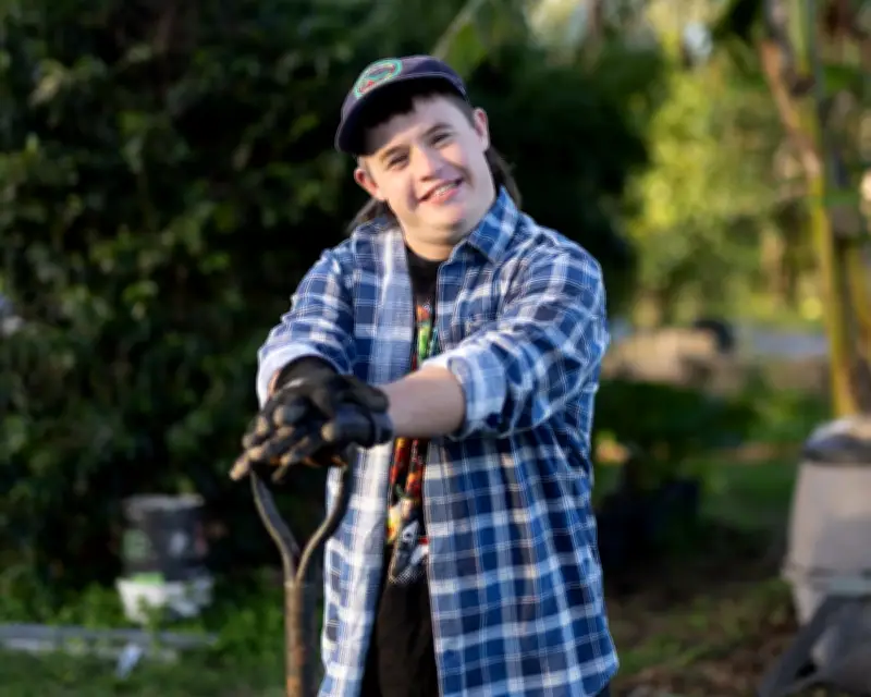 NDIS Cuts Threaten Vital Social Programs for Young Man with Down Syndrome
