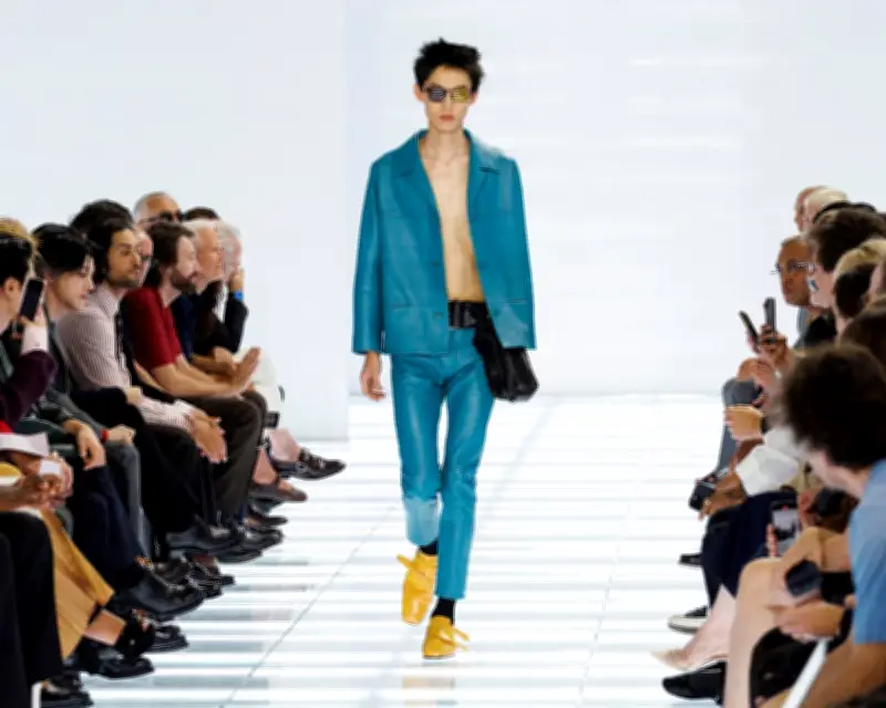 Prada and Simons Reject 'Useless Design' with Minimalist Vision