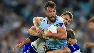 Cronulla Sharks prop Toby Rudolf sidelined for up to a month with knee injury