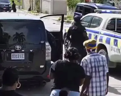 Jamaican police officer charged with murder after shooting woman at protest