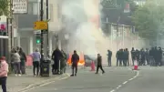 Anti-Immigration Protesters Torch Vehicles, Block Roads in Belfast