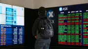 Australian shares flat as tech stocks surge, Middle East tensions weigh