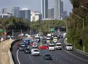 Car and truck crash reduces Mitchell Freeway to single lane in Perth