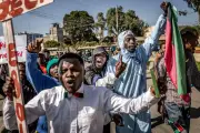 Global Snapshots: Protests, Conflict, and Pope's Visit on Tuesday