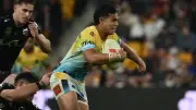 Keano Kini's magic try sinks Broncos 28-23, Titans stun Brisbane