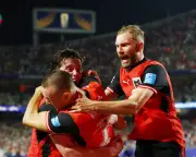 Late Drama Sends Austria and Algeria into World Cup Knockouts