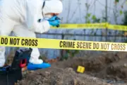 Pathologist Arrested After Bodies of 32 Babies Found in Backyard