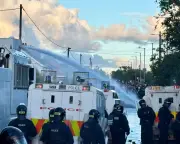 Police Use Water Cannon to Disperse Anti-Immigration Rioters in Northern Ireland